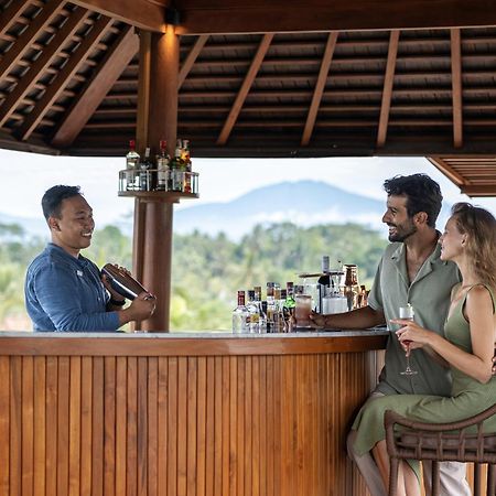 Hotel Adiwana Suweta Ubud Exterior foto The bar at the resort