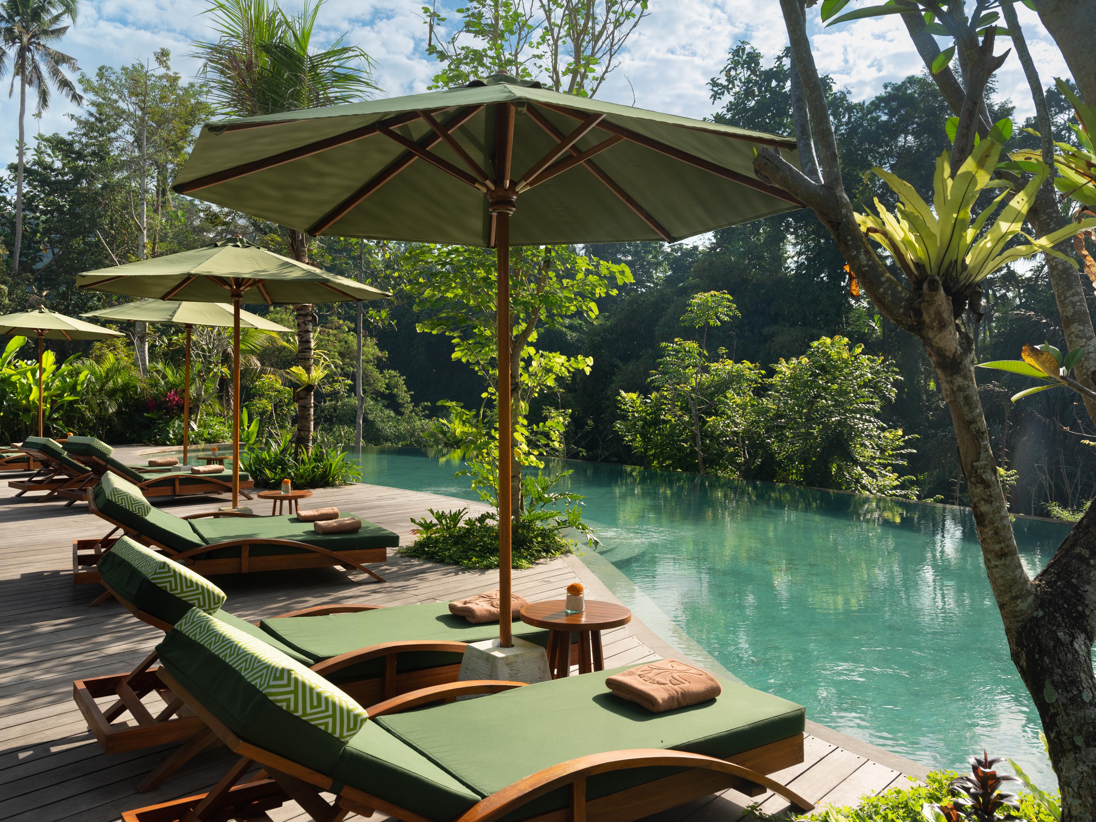Hotel Adiwana Suweta Ubud Exterior foto The resort's swimming pool